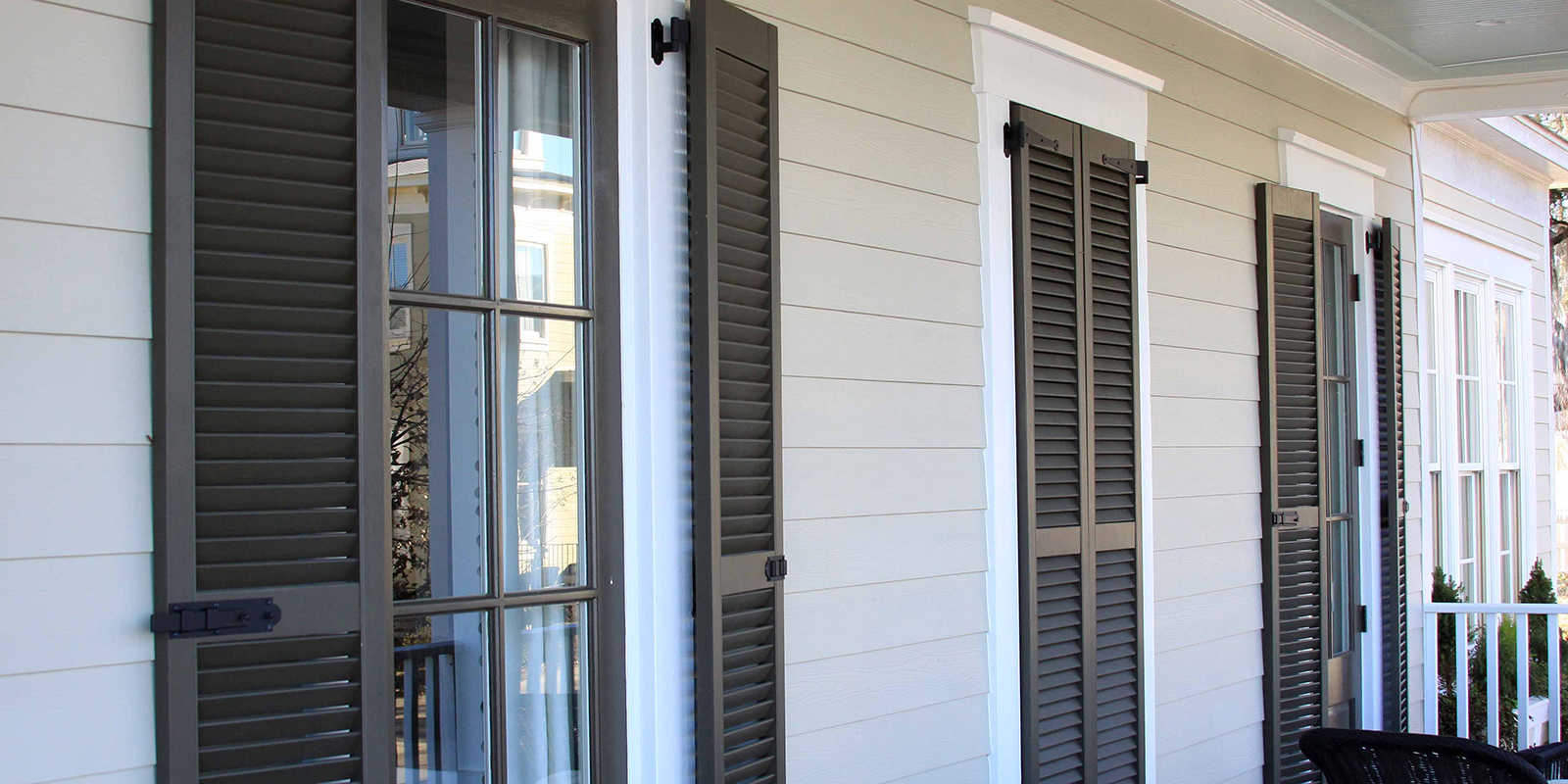 Brown exterior plantation shutters